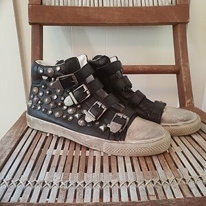 Black studded sneakers
